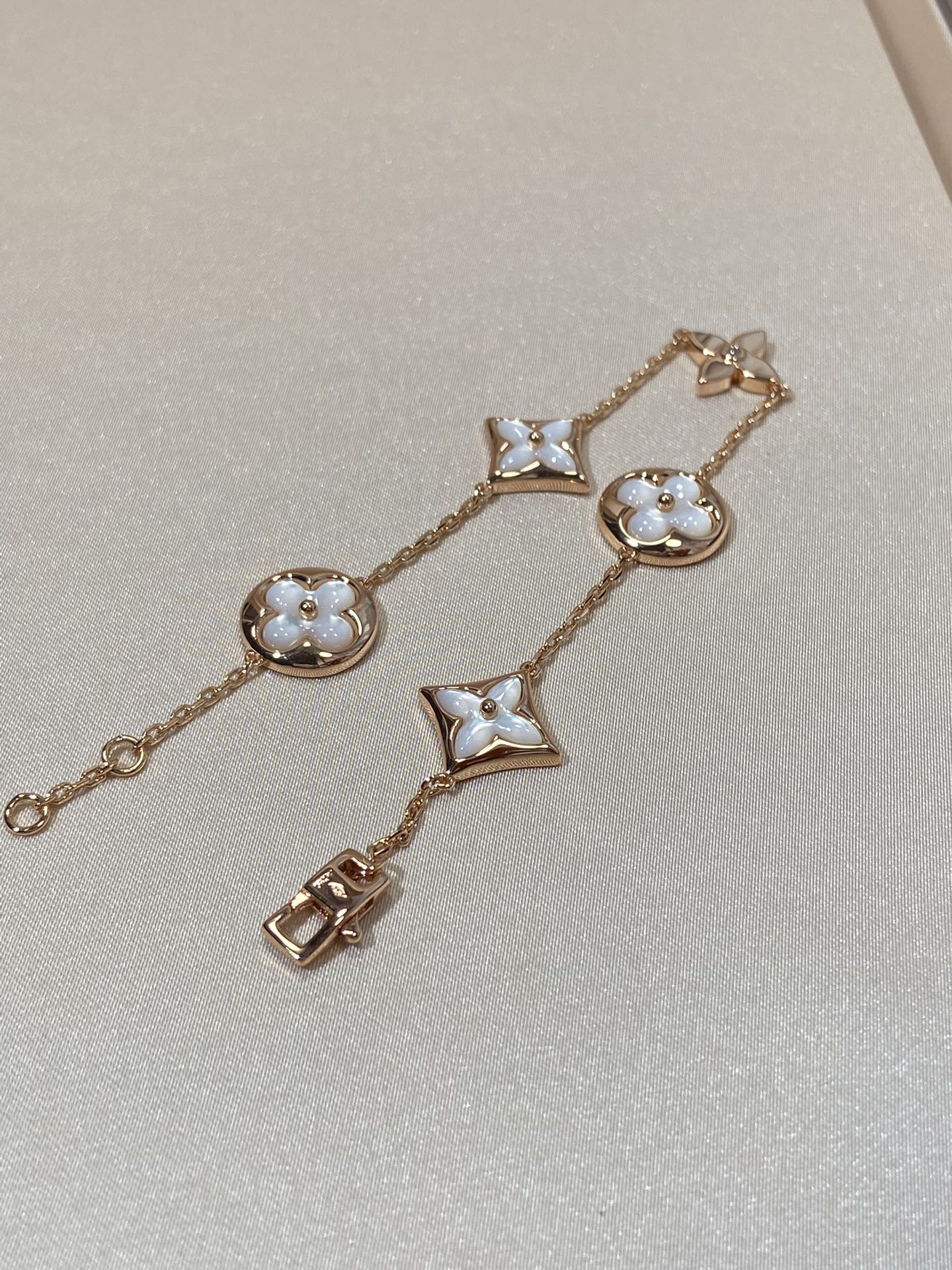 Miro STAR AND SUN 5 MOTIF MOP PINK GOLD BRACELET