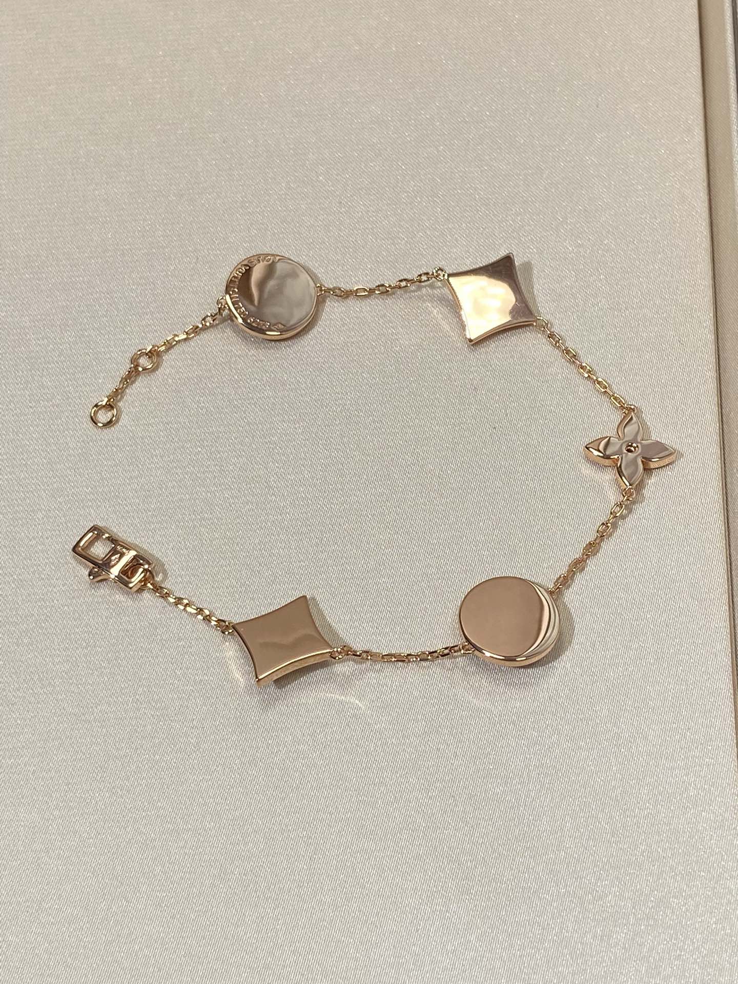 Miro STAR AND SUN 5 MOTIF MOP PINK GOLD BRACELET